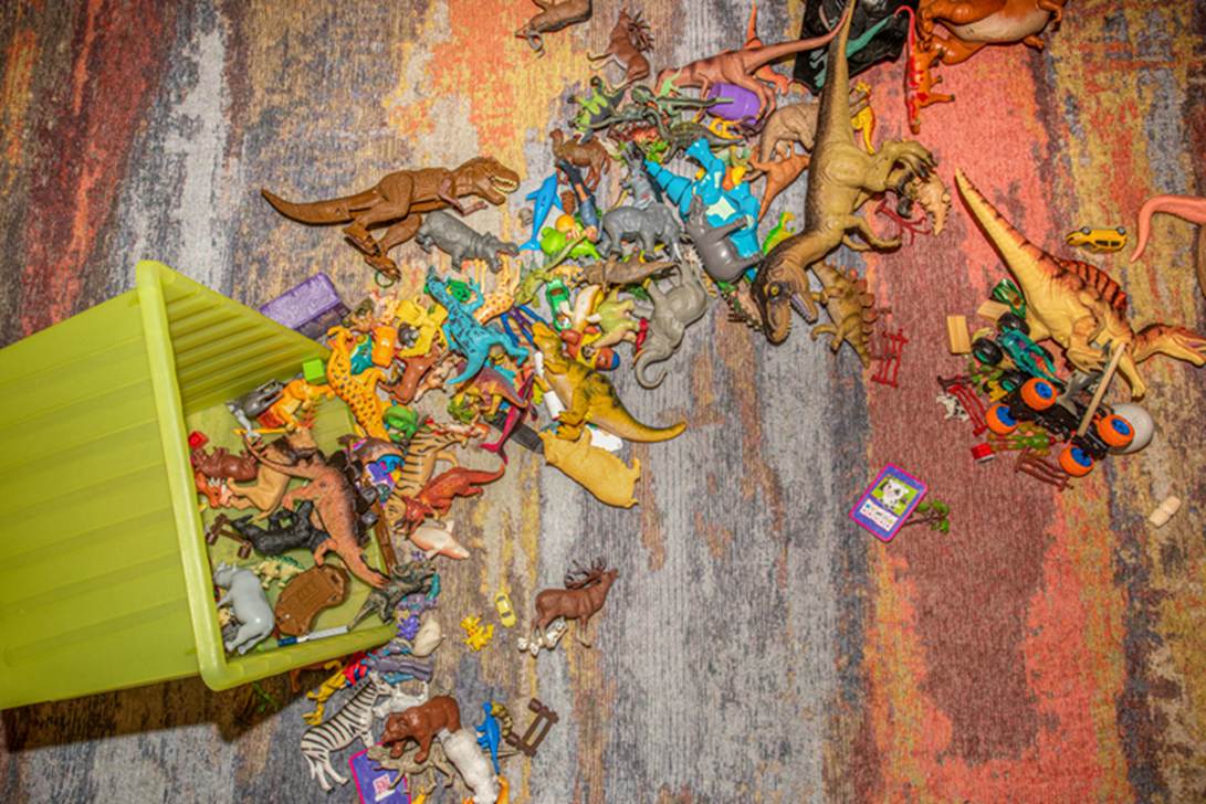 A pile of toys on the floor
AI-generated content may be incorrect.